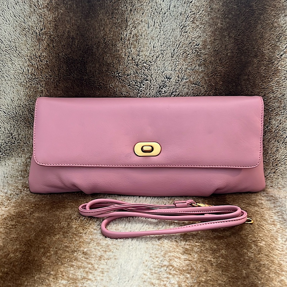 Clutch, with strap. Pink. With gold hardware. Leather